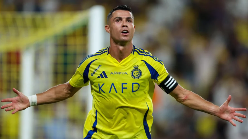 Selebrasi Cristiano Ronaldo usai mencetak gol untuk Al Nassr.